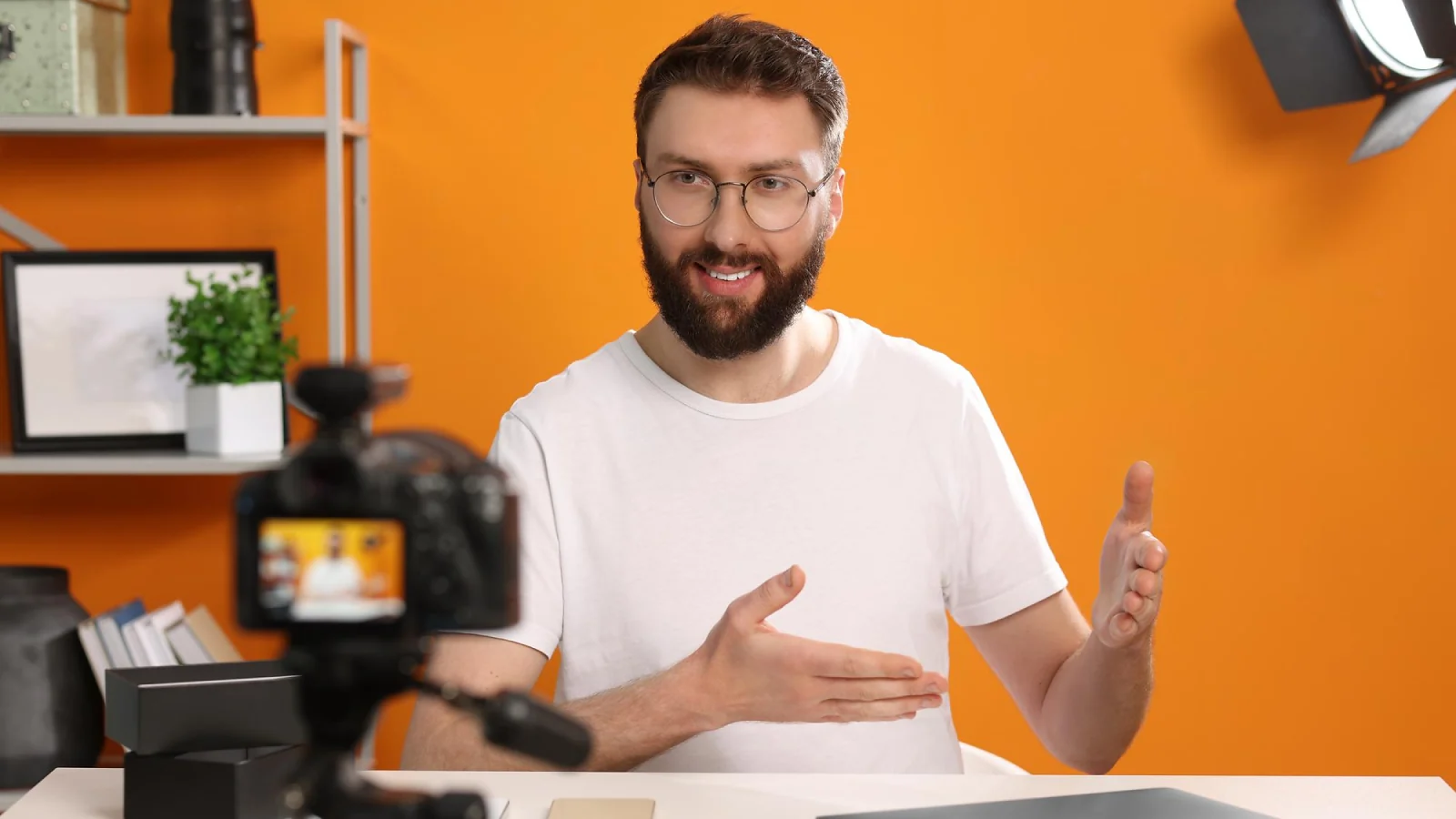 A man in front of a camera