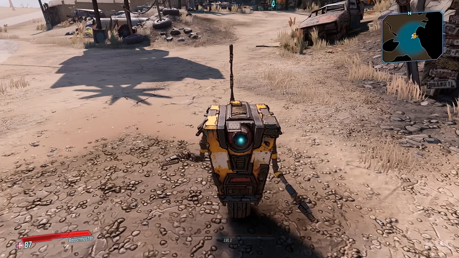 Borderlands 3 gameplay showing a robot companion walking through a desert environment.