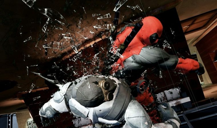 Deadpool action scene showing the antihero crashing through shattered glass