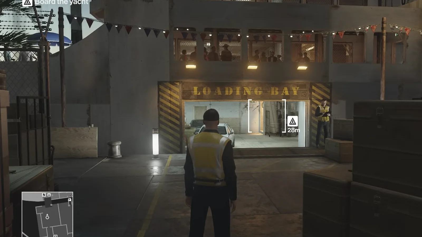 Hitman gameplay showing Agent 47 approaching a guarded loading bay.