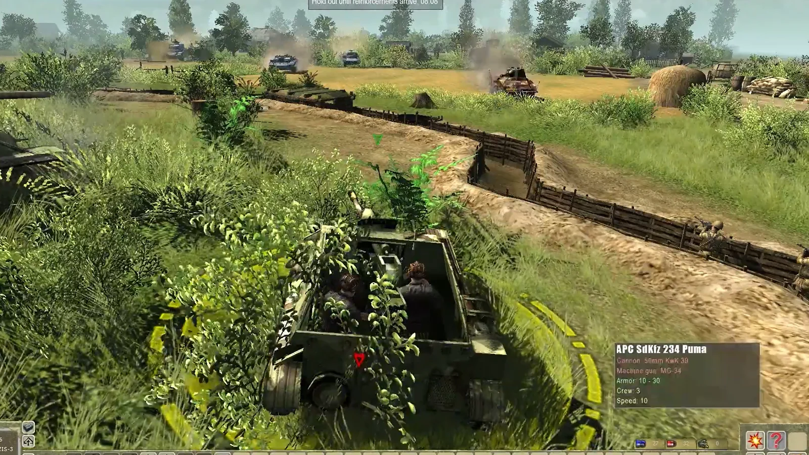 A military vehicle advances through a green rural battlefield.