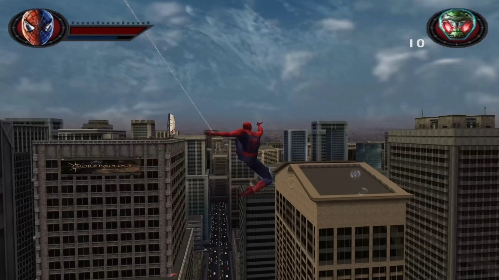 Spider-Man web-swinging above city streets in the 2002 Spider-Man: The Movie game