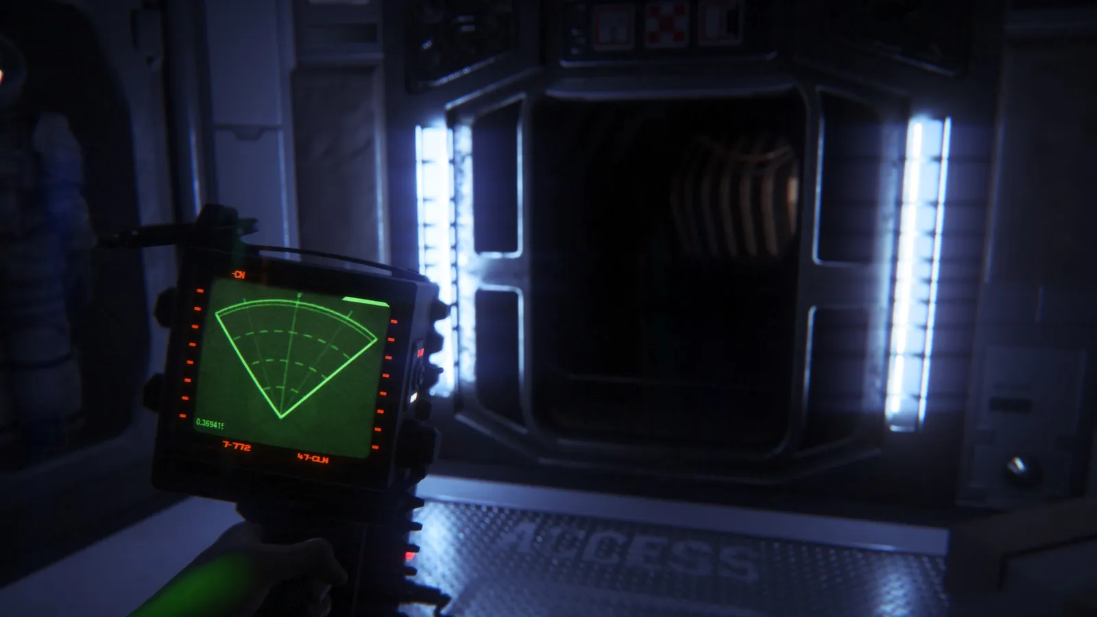 Alien: Isolation motion tracker held up near a dark passage