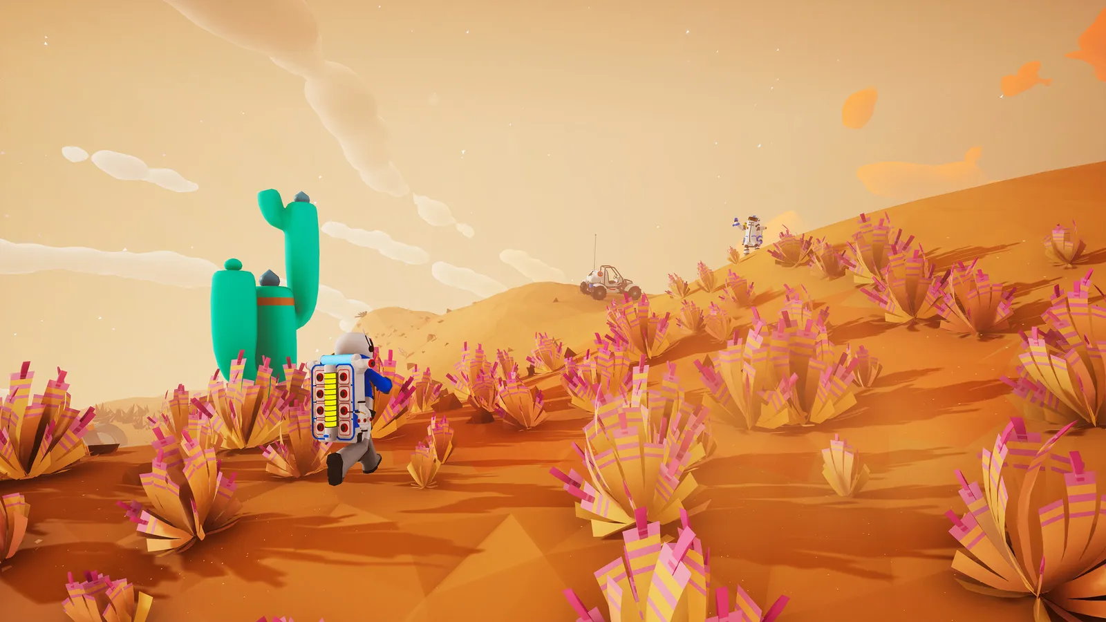 Astroneer astronaut in orange desert dunes with buggy