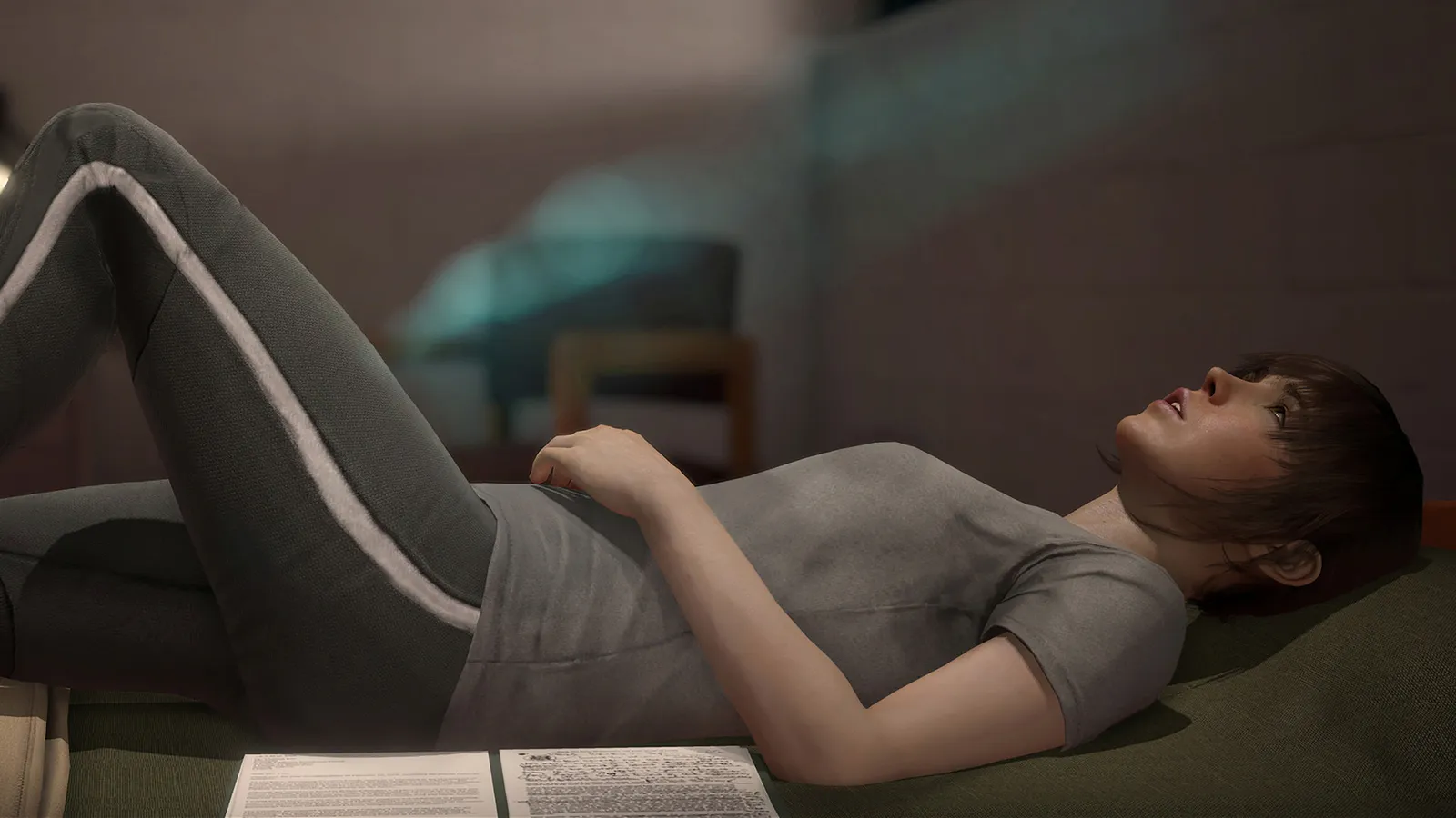 Beyond: Two Souls lying on couch reading documents
