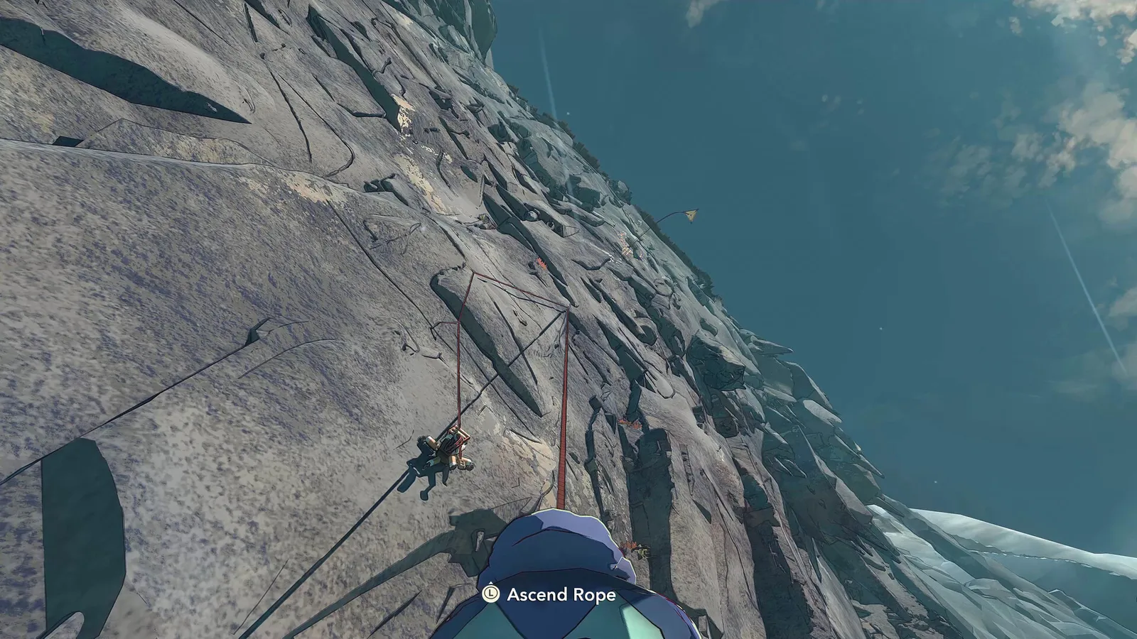 Cairn first person view ascending rope on steep granite cliff