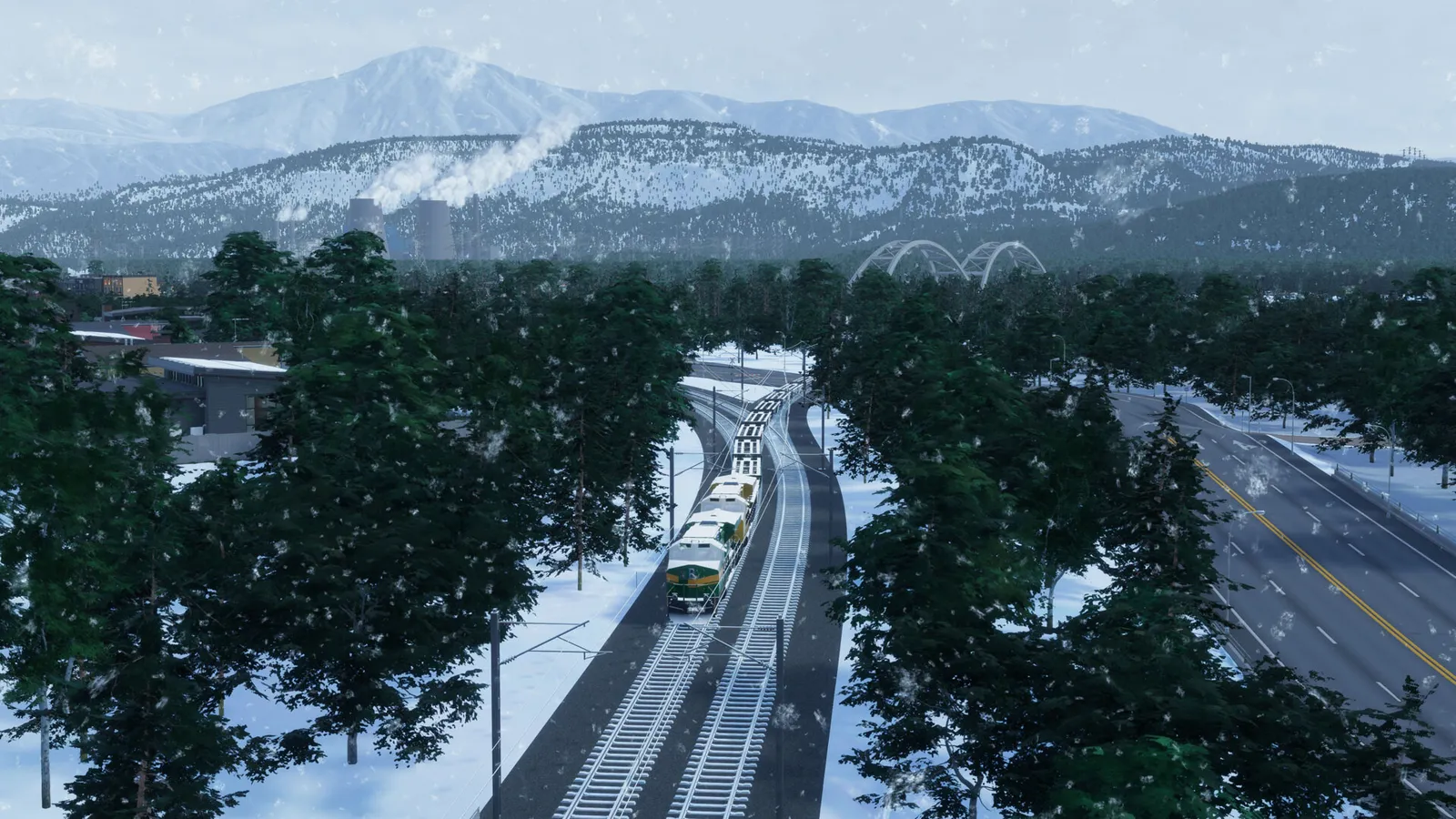 Cities Skylines 2 cargo train passing through snowy mountain valley