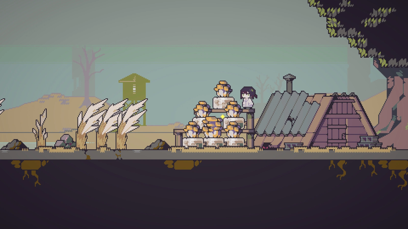 Doloc Town girl sitting atop pyramid of stacked crates by old cabin