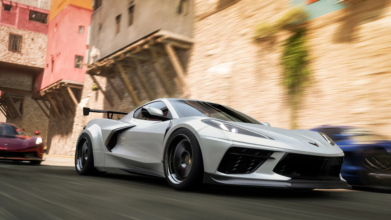 Forza Horizon 5 corvette drifting through colorful village