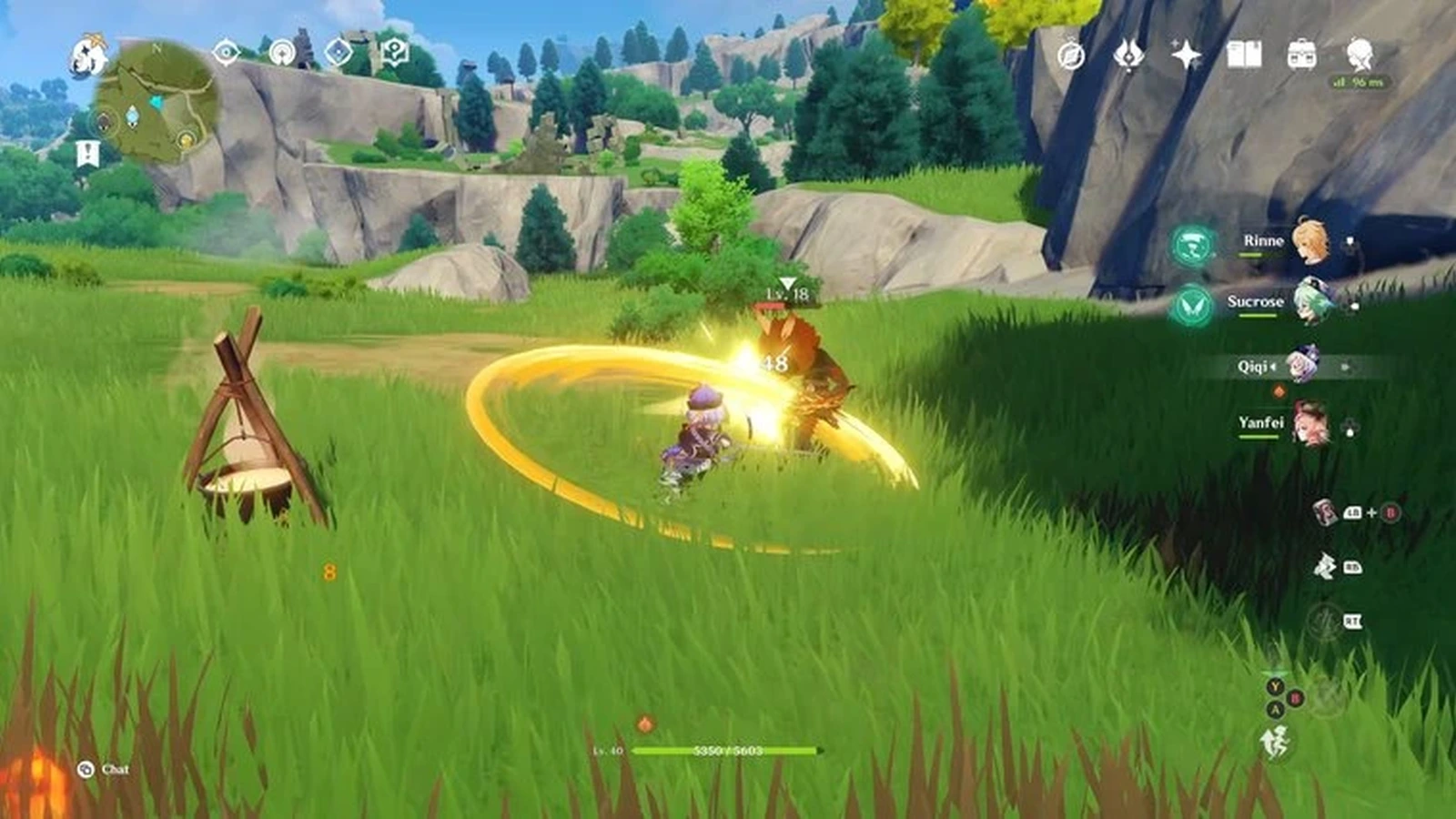 A character lands a golden spinning attack on an enemy in an open grassy field