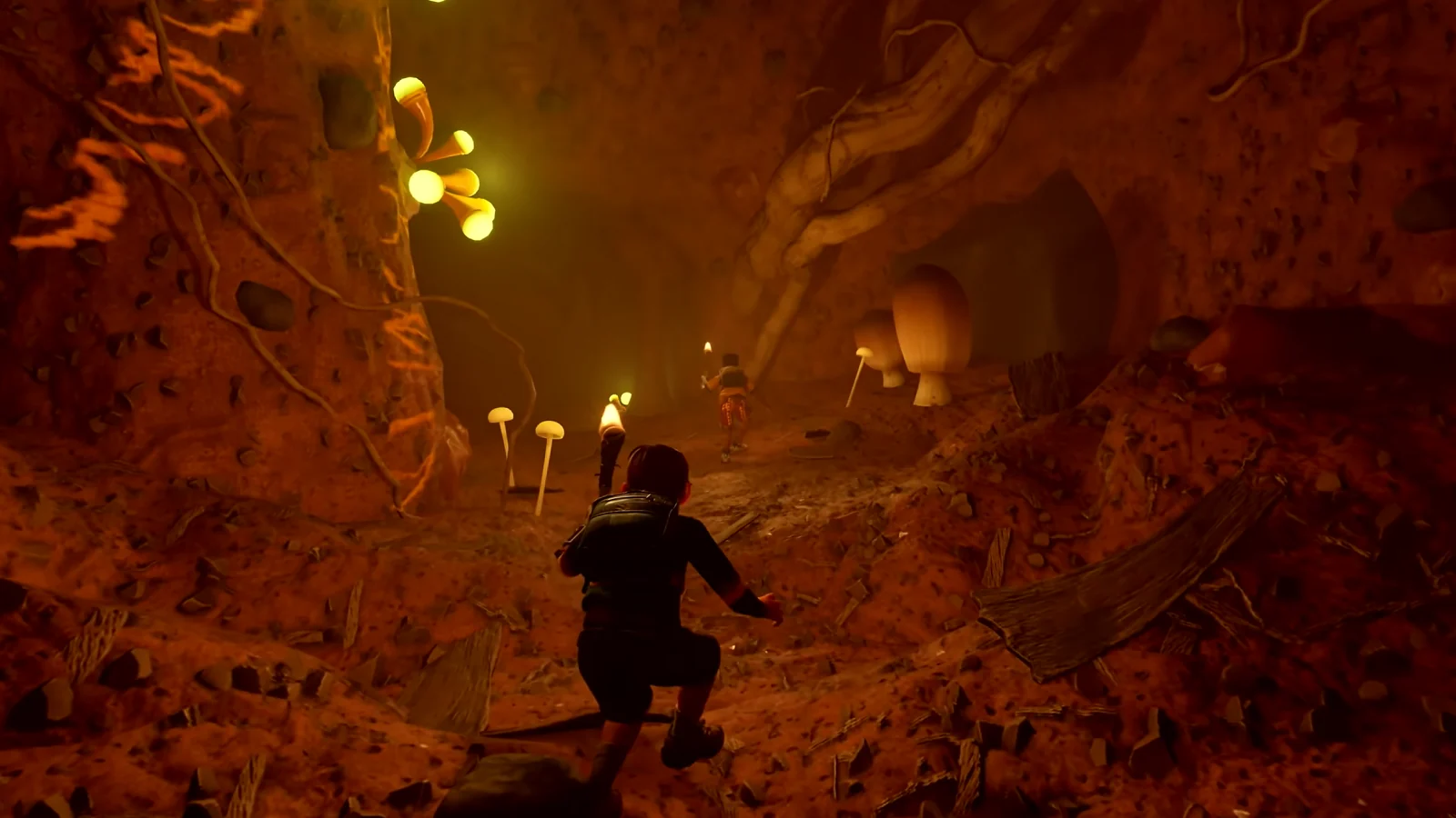 Un personnage explore une grotte souterraine obscure, éclairée par des champignons luminescents.