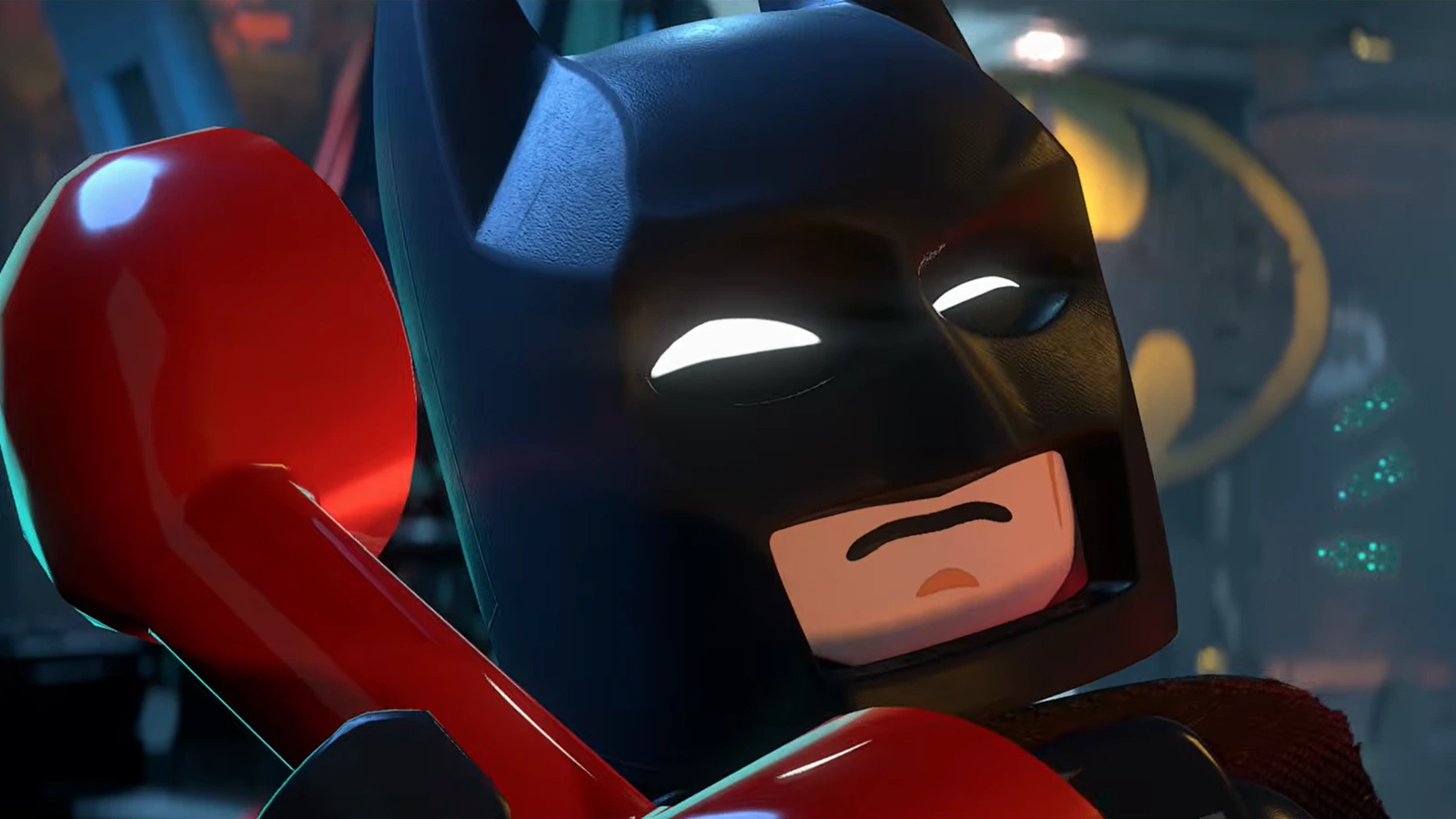 A grumpy LEGO Batman holds a red Bat-phone to his ear, with the glowing Bat-Signal behind him