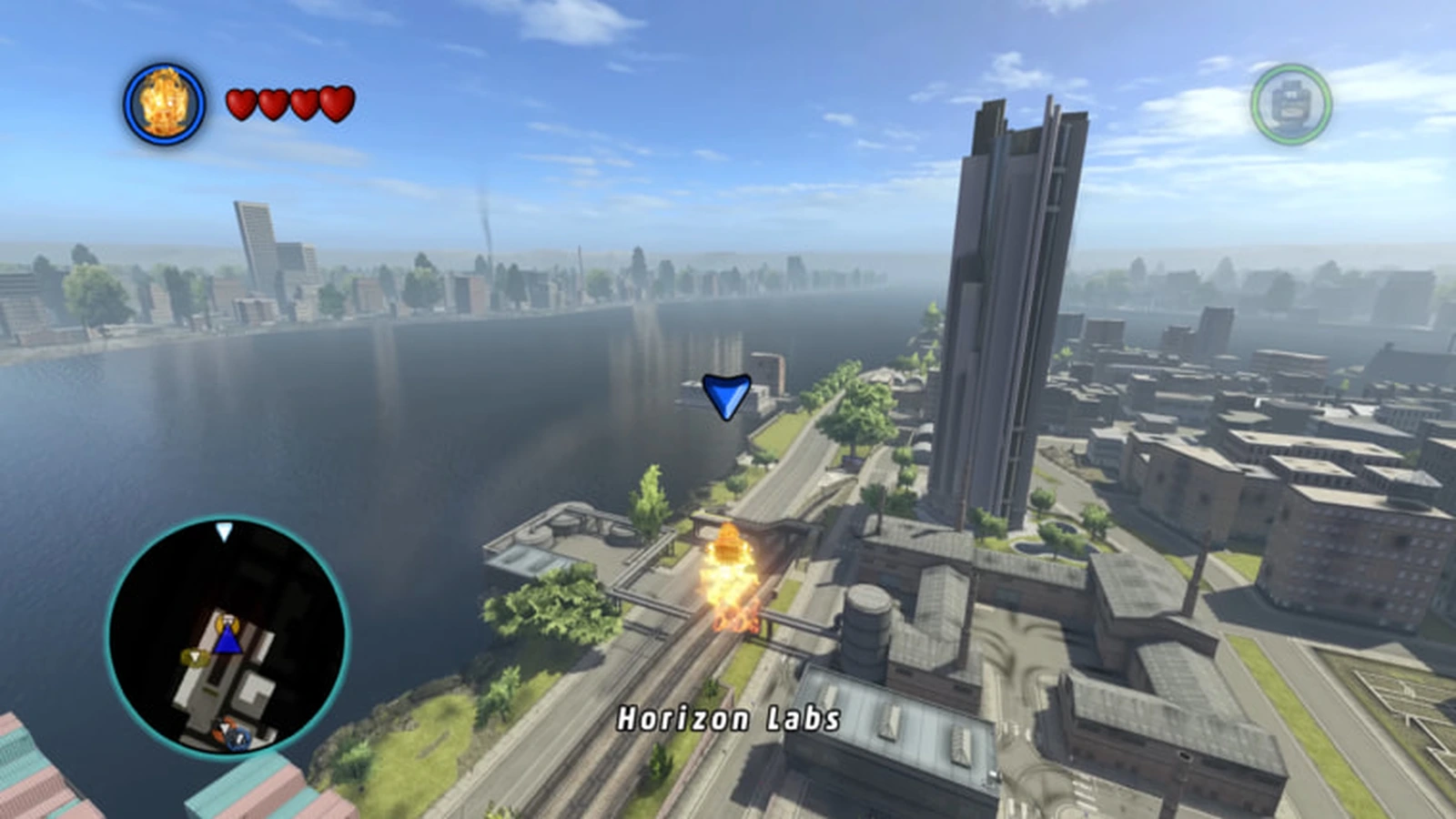 The Human Torch flies in flames over a riverside city toward Horizon Labs
