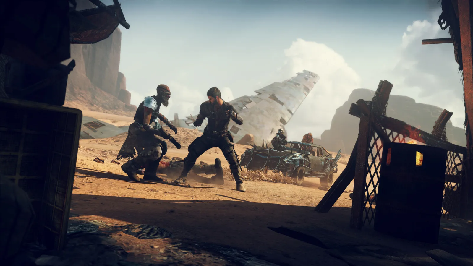 Mad Max max squaring off against raider by crashed plane