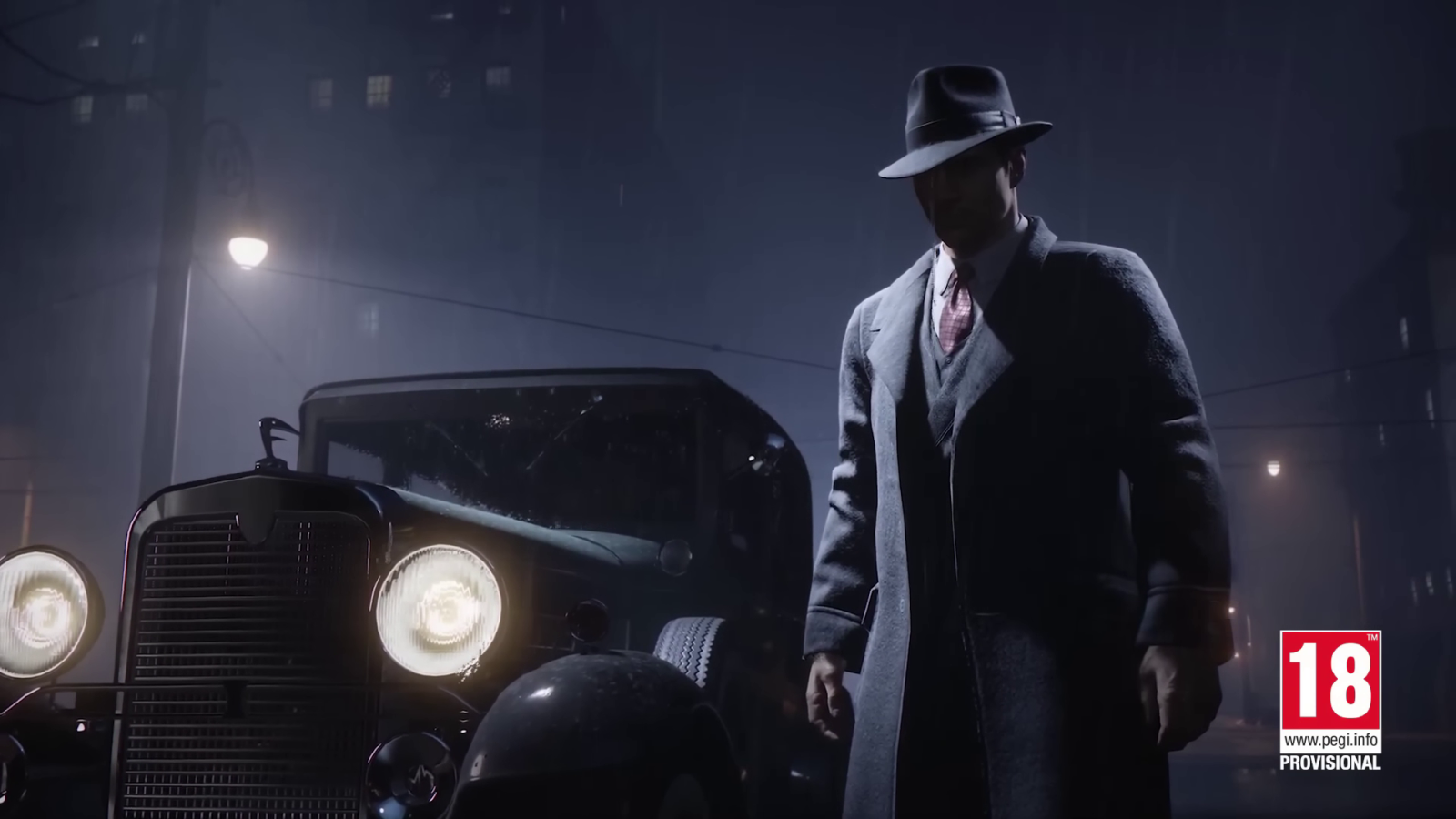 Mafia: Trilogy gangster in overcoat and fedora beside car at night