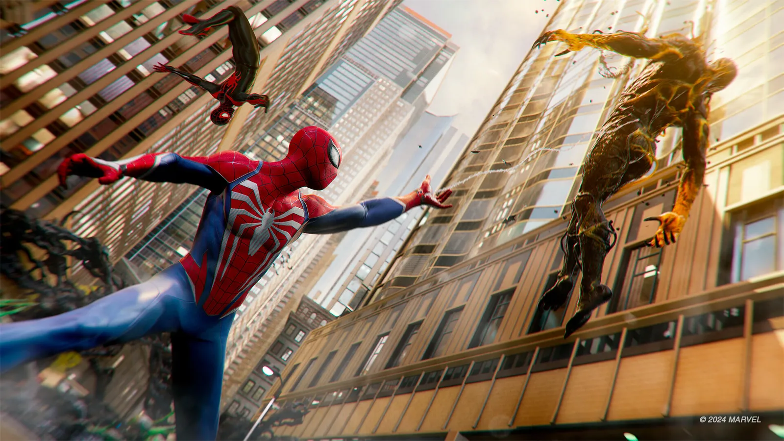 Marvel's Spider-Man 2 marvel s spider man spider man reaching toward falling vulture like enemy with miles above