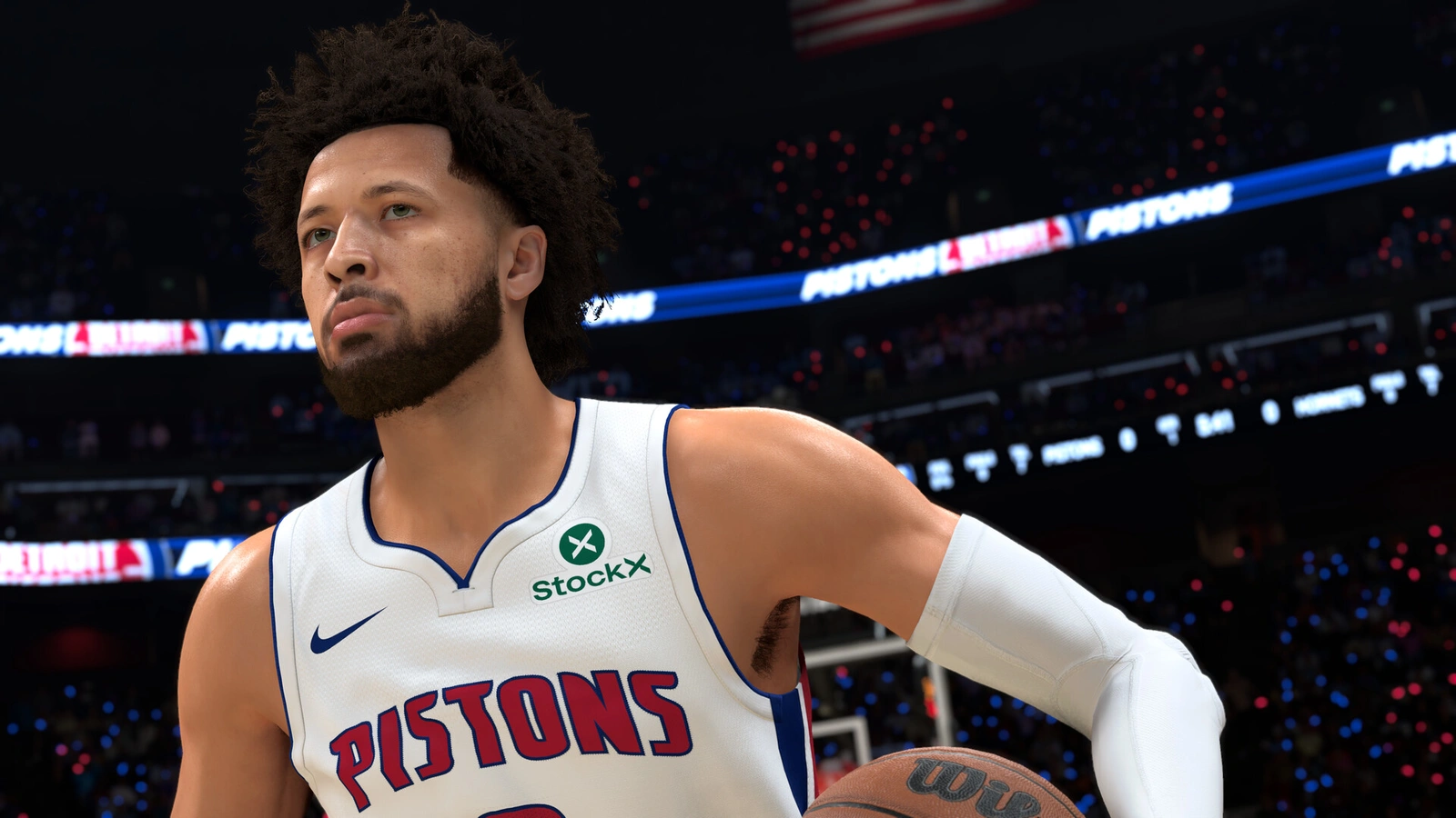NBA 2K27 Pistons player dribbling the ball courtside.