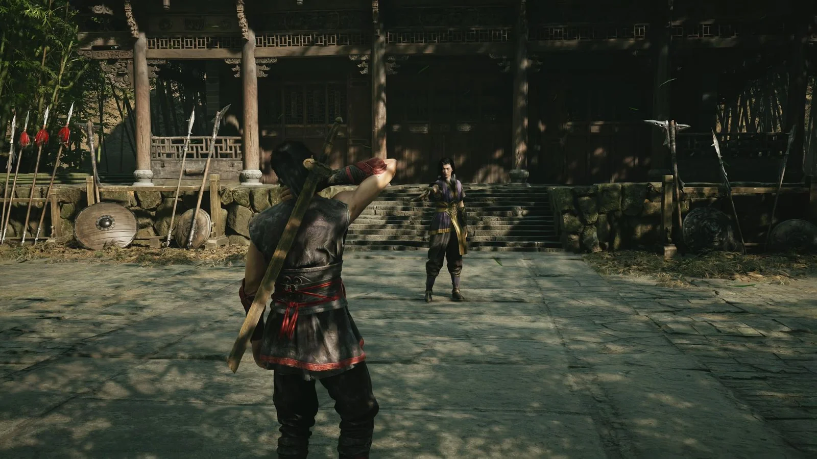Phantom Blade Zero young fighter training with master in temple courtyard