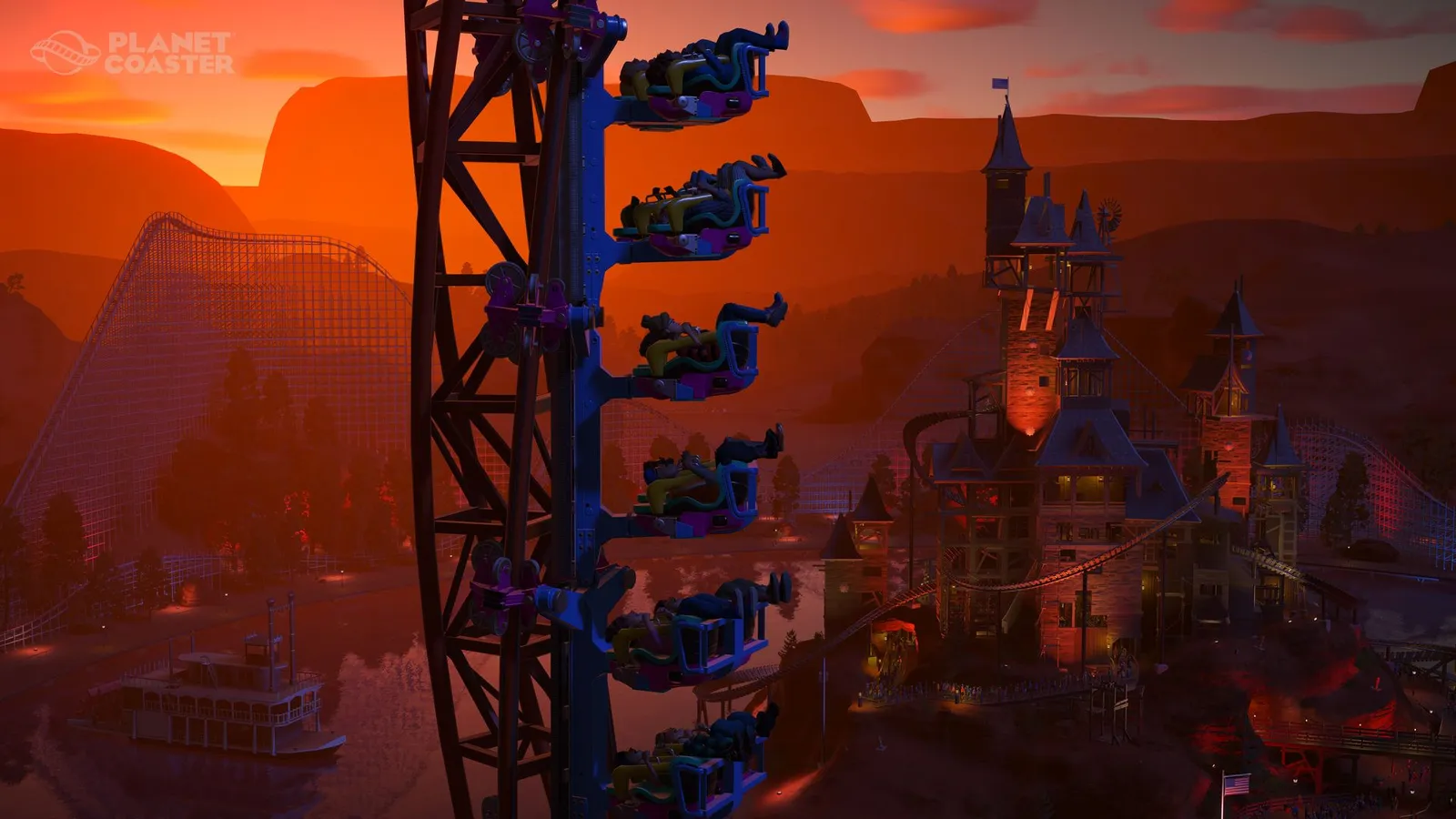 Planet Coaster suspended coaster train over western themed park at sunset