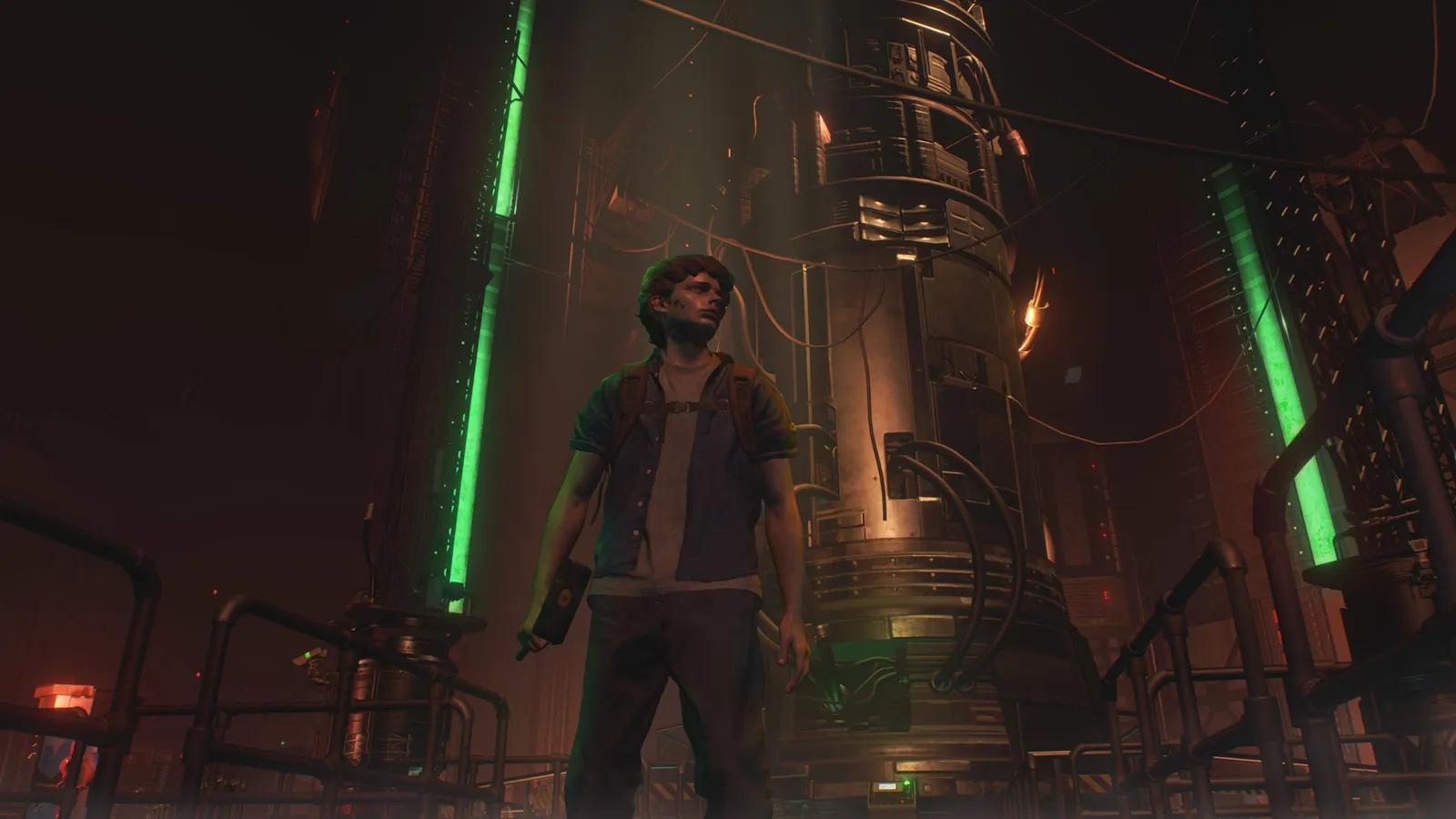 Resident Evil 3 man holding an explosive device in an industrial chamber
