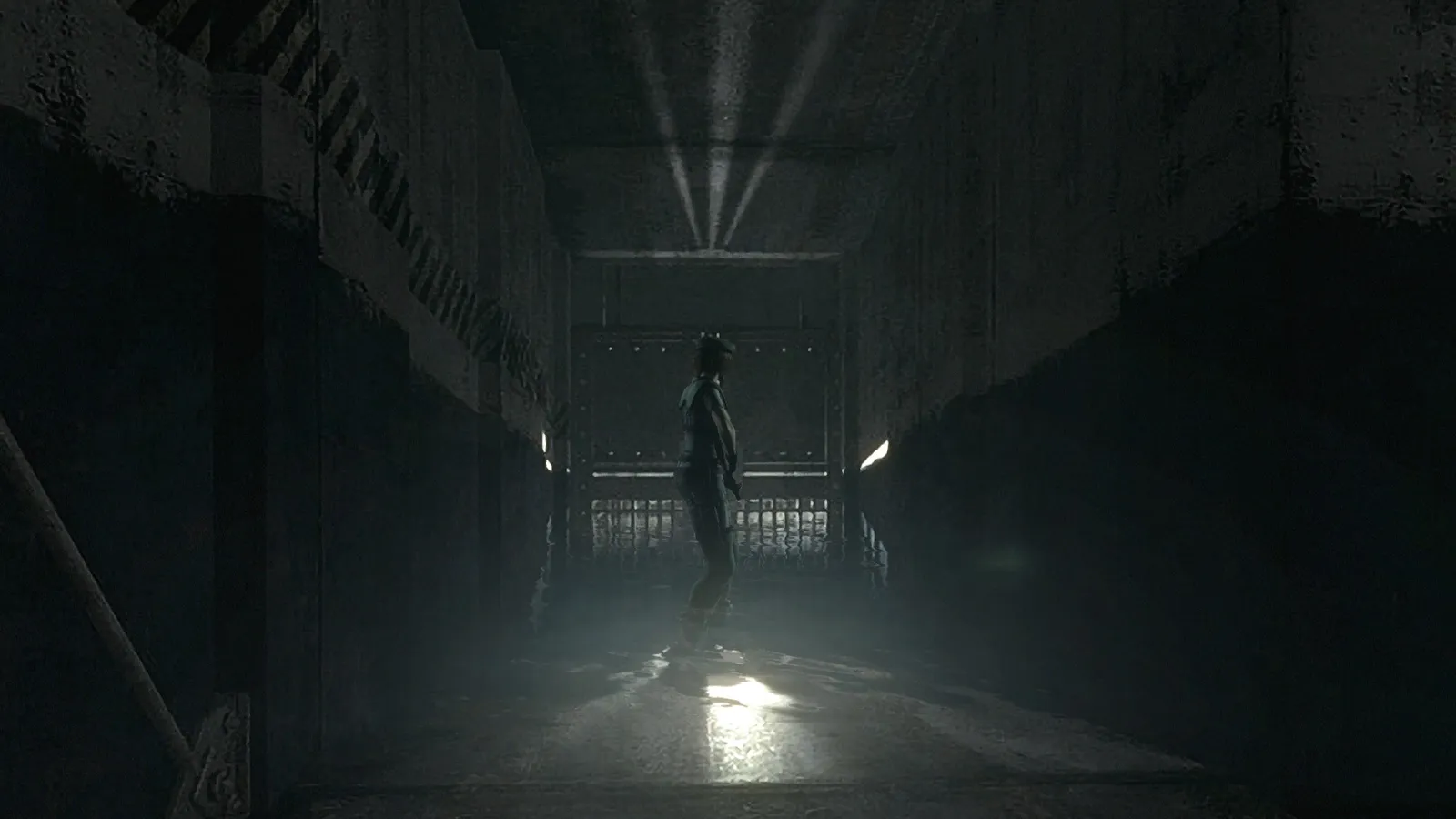 Resident Evil - Biohazard HD Remaster silhouette approaching locked gate corridor