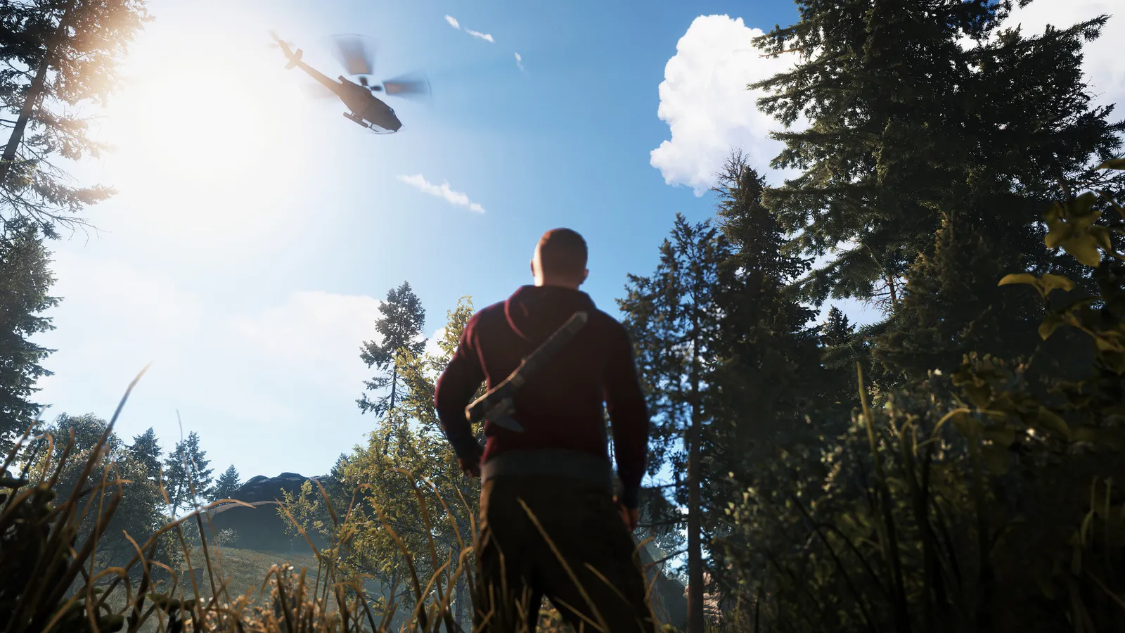 Rust survivor watching helicopter fly overhead in forest