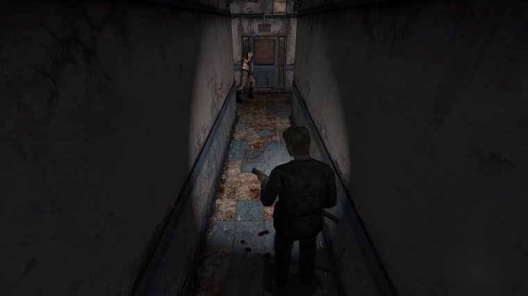 Silent Hill 2 – character exploring a dark corridor