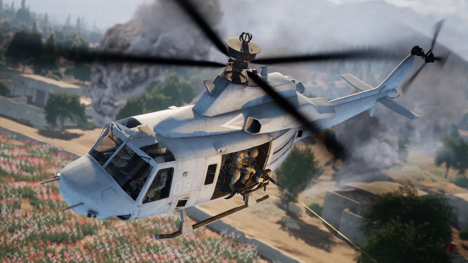 Squad gunner s view from inside a utility helicopter flying over fields