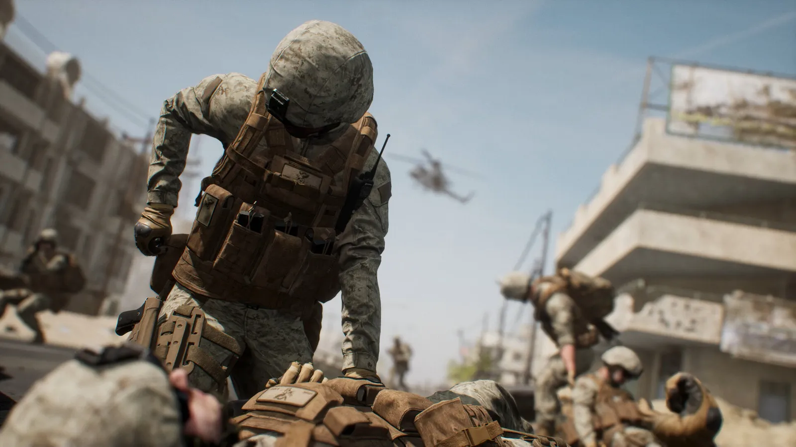 Squad soldiers huddle around a wounded teammate as a helicopter flies overhead