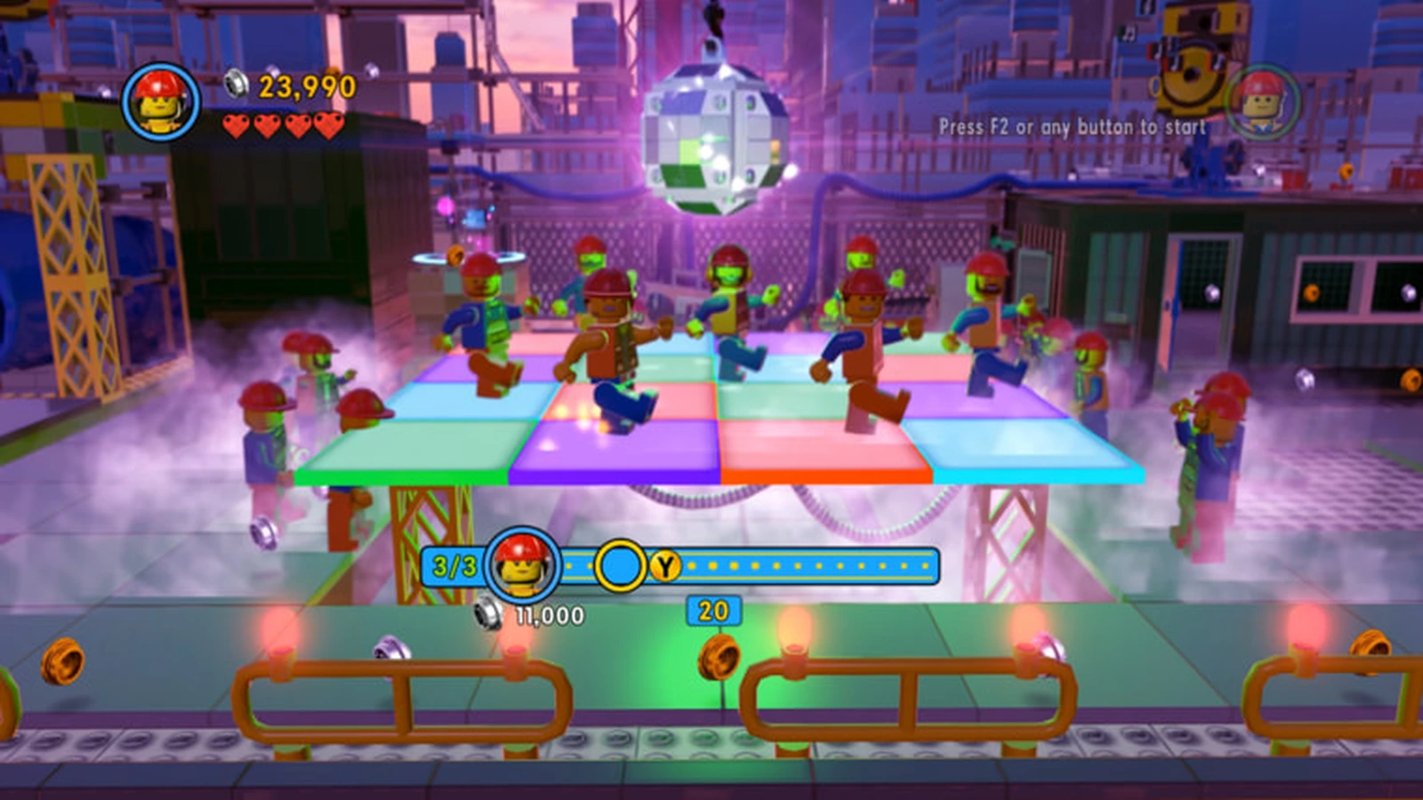 Construction worker minifigures dance on a colorful disco floor under a glittering mirror ball